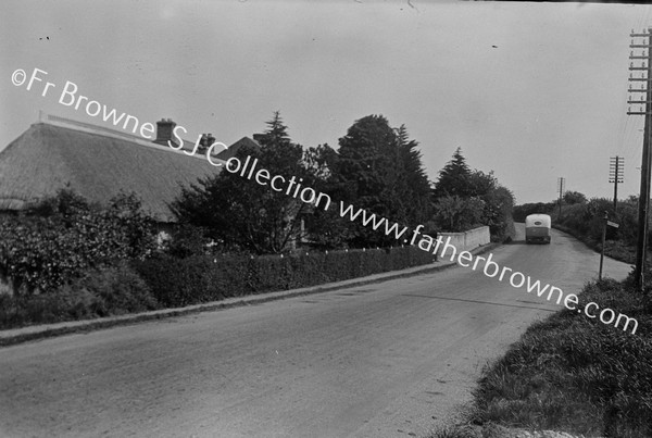 COUNTRY ROAD  THATCHED COTTAGE  BUS